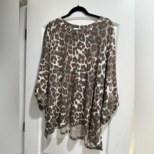 - Adrienne animal print tunic top, size medium.